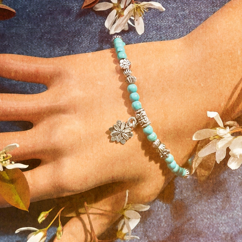 Turquoise Bracelet with silver lotus flower Close up