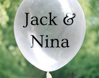 May include: A clear balloon with the text "Jack & Nina" printed on it.