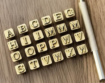 Juego de 27 sellos con letras del alfabeto, herramientas de perforación de acero y metal para cuero, letras mayúsculas y minúsculas.