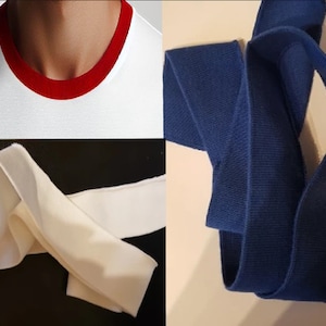 Könnte beinhalten: Zwei verschiedene Arten von Stoffbesatz. Einer ist weiß und der andere ist blau. Beide sind gefaltet und bereit zum Nähen.