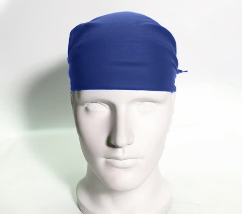 May include: A solid blue bandana made of a soft, stretchy fabric. The bandana is tied around a mannequin's head.