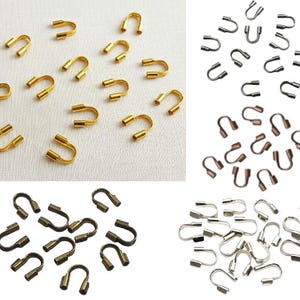 100 protectores de cable para encordar - Dorado, plateado, bronce, cobre y negro - Cuentas de bucle para proteger el cable - Protector de cable
