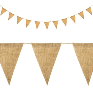 May include: A string of burlap triangle flags, with a brown twine string, is strung across a white background. Below the string of flags, there are three more burlap triangle flags, with a brown twine string, strung across a white background.