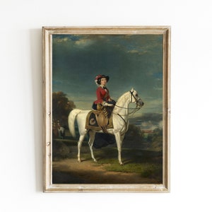 May include: A painting of a woman in a red and white dress riding a white horse. The woman is wearing a hat and holding the reins. The horse is standing in a field with trees and a river in the background.