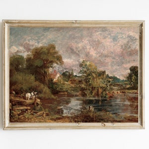May include: A painting of a rural landscape with a river, trees, and a farmhouse in the distance. The sky is cloudy and the water is reflecting the light. The painting is framed in a light wood frame.