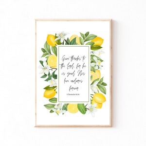 May include: A white printable art print with a lemon wreath border and a bible verse from 1 Chronicles 16:34 that reads "Give thanks to the Lord, for he is good. His love endures forever."