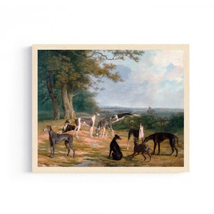 May include: A vintage oil painting depicting a group of greyhounds in a grassy field. The dogs are in various poses, some standing, some lying down, and some running. The painting is set against a backdrop of a lush green forest and a blue sky with white clouds.
