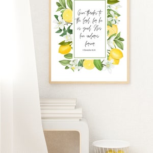 May include: A printable art print with a white background and a lemon wreath border. The print features the bible verse "Give thanks to the Lord, for he is good. His love endures forever."  1 Chronicles 16:34.