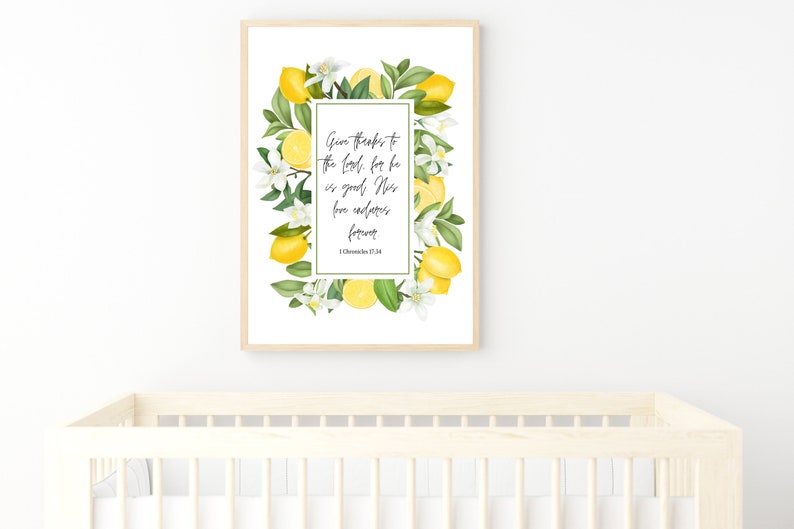 May include: A framed print with a white background and a lemon wreath border. The print features the text "Give thanks to the Lord, for he is good; His love endures forever. 1 Chronicles 17:16".