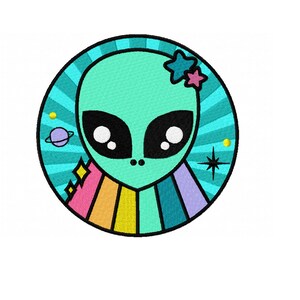 May include: A green alien face with large eyes and a rainbow behind it. The alien is wearing two pink and yellow stars on its head. The background is a blue circle with white stripes.