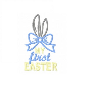 May include: A light blue bow with gray bunny ears and the text "MY first EASTER" in yellow.
