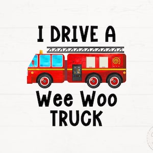 May include: A red fire engine illustration with the text "I Drive a Wee Woo TRUCK". The engine has blue windows, a ladder, and black wheels. The design is on a white wood grain background.