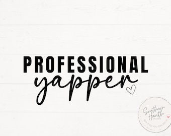 May include: Black and white text graphic that reads "Professional yapper" with a small heart symbol. The text is in a bold, sans-serif font. The graphic is on a white wood background.