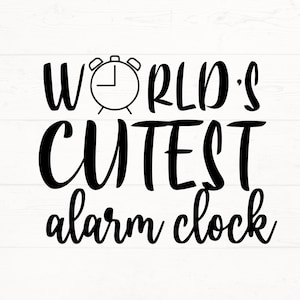 May include: Black and white graphic text that reads "World's Cutest Alarm Clock" with a black and white alarm clock icon above the text.