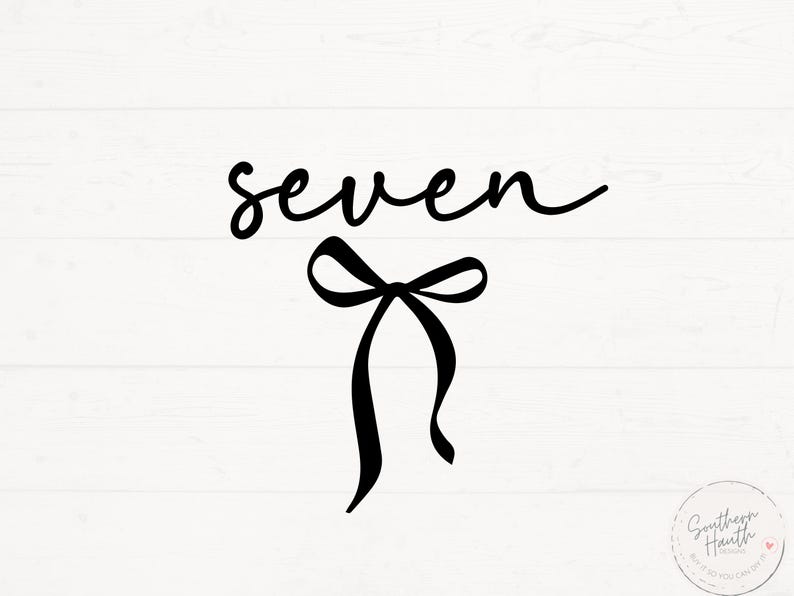 May include: Black cursive text that reads "seven" with a black bow below it. The background is white with a wood grain pattern. The lower right corner has a small circular logo with text.