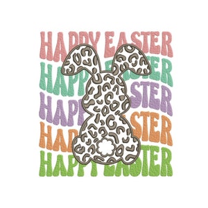 Puede incluir: Texto de Feliz Pascua en un arcoíris de colores con un conejito marrón y blanco con estampado de leopardo en el centro.