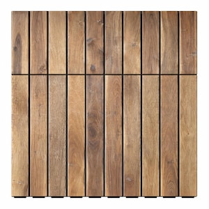 May include: Square wooden deck tile with a natural wood grain finish. The tile is composed of vertical wooden slats with dark lines in between. The wood has varying shades of brown and tan, creating a textured appearance. The tile is designed for outdoor use.
