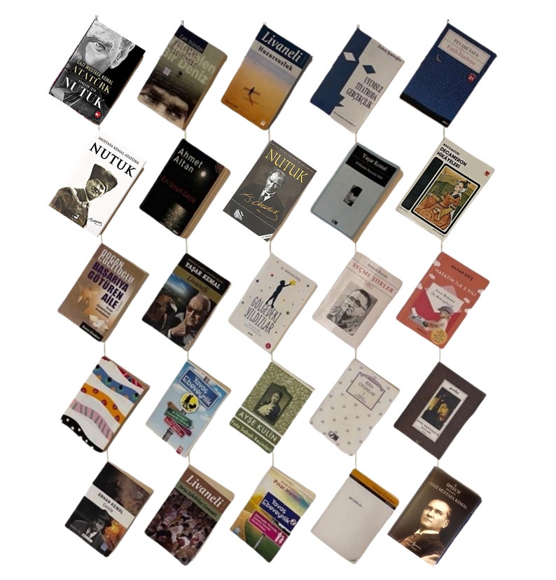 May include: An assortment of small books, each with a unique cover design and title. The books are suspended by strings, creating a visually interesting display. The covers feature portraits, illustrations, and text in various fonts and colors.