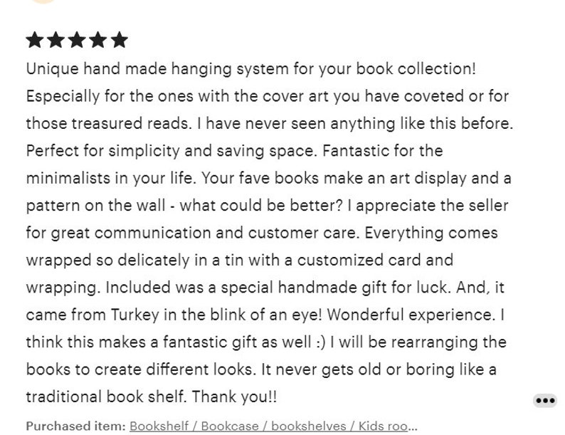 May include: Text from a customer review for a handmade hanging book system. The review praises the product's simplicity, space-saving design, and the seller's communication. The reviewer mentions the product is a great gift.