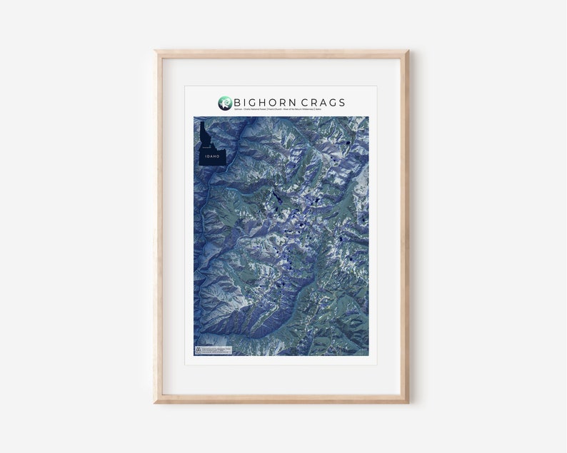 May include: A framed map of the Bighorn Crags in Idaho, showing the area's topography with blue and green hues. The map is titled "Bighorn Crags" and includes the state outline of Idaho.