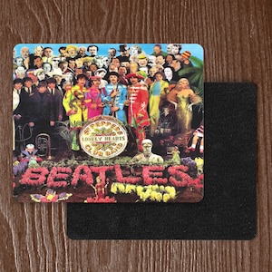 May include: A colourful vintage album cover featuring a group of people with the text "Sgt. Pepper's Lonely Hearts Club Band" and "Beatles" in large letters.