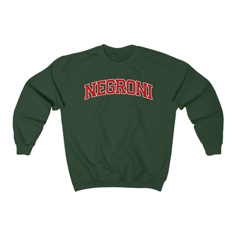 May include: A dark green sweatshirt with the word "NEGRONI" printed in red letters across the front.