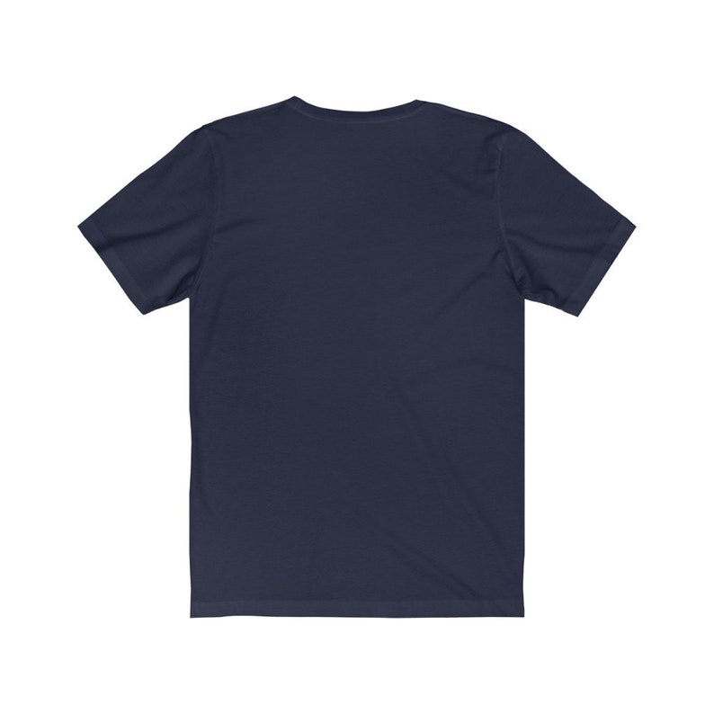 May include: A plain navy blue short-sleeved t-shirt.