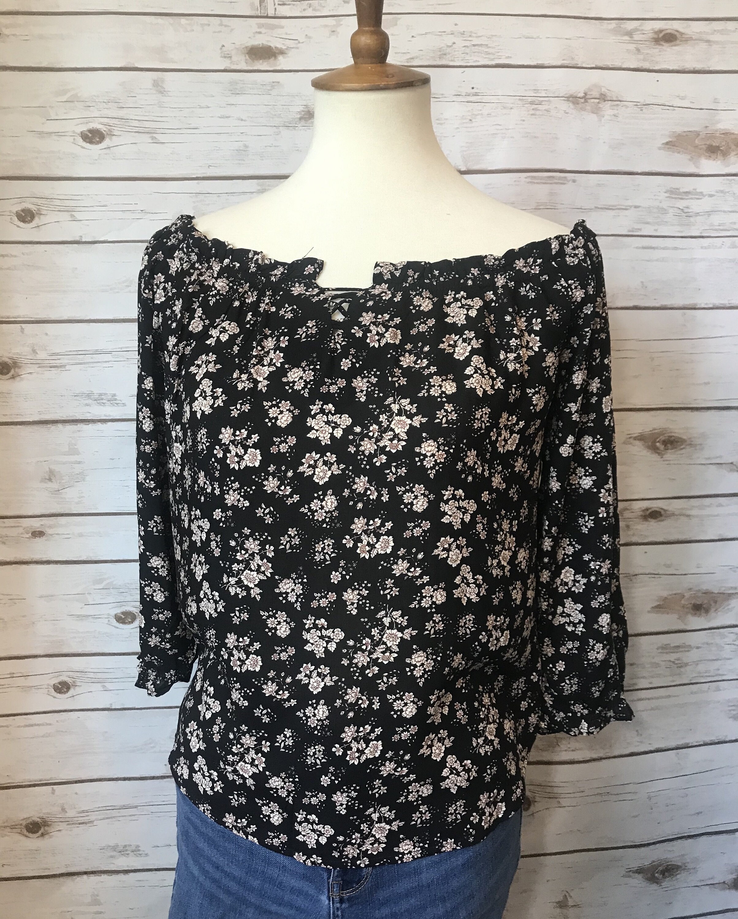 black floral off the shoulder top