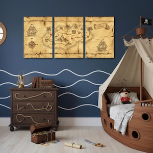 May include: A child's bedroom with a pirate theme. Three framed panels depict a treasure map. A wooden ship-shaped bed is on the right, and a wooden dresser with rope detailing is on the left. A treasure chest and a rolled-up map are on the floor.