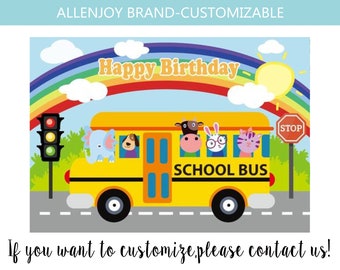 May include: A yellow school bus with a rainbow and clouds in the background. The bus has the words "SCHOOL BUS" on the side and a stop sign on the right. The bus is filled with animal characters. The text "Happy Birthday" is written in a rainbow arch above the bus.