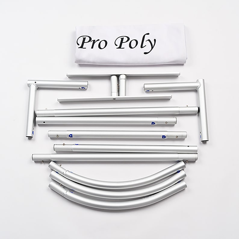May include: A set of silver aluminum poles and connectors for a pop-up backdrop stand. The set includes straight poles, curved poles, and corner connectors. The white fabric backdrop is labeled "Pro Poly".