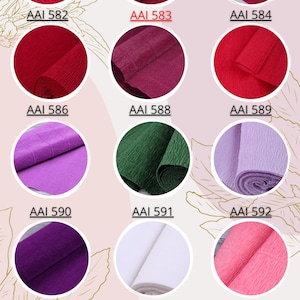 May include: A palette of 15 different colors of tissue paper. The colors include red, pink, purple, green, white, black, and gray. The tissue paper is arranged in a grid pattern.