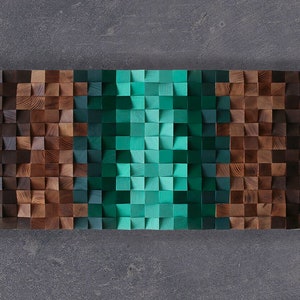 May include: A wall art piece made of wood blocks in shades of brown and teal. The blocks are arranged in a geometric pattern, creating a modern and abstract design.