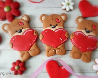 Teddy bear holding a heart