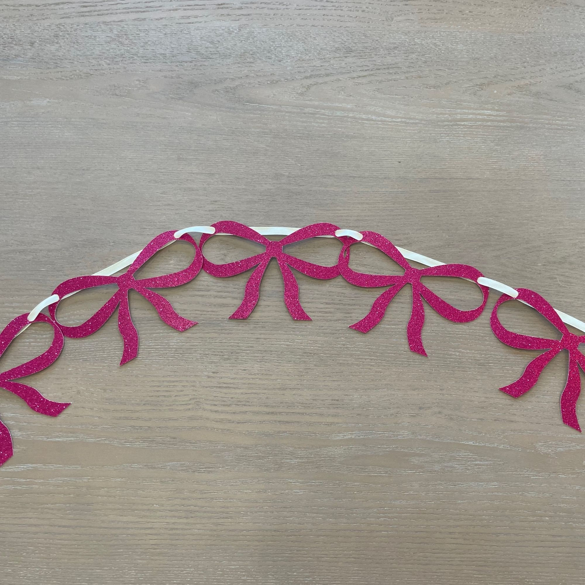 Ghirlanda con fiocco rosa per decorazioni per feste di addio al