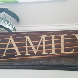 Custom made, charred, engraved wooden sign. FAMILY