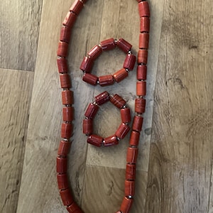 Nigerian Coral or Red Color Beads Sets. Unisex Neck and Wristbands with &quot;invisible&quot; clear beads. For adults and children. Nigerian Royalty.