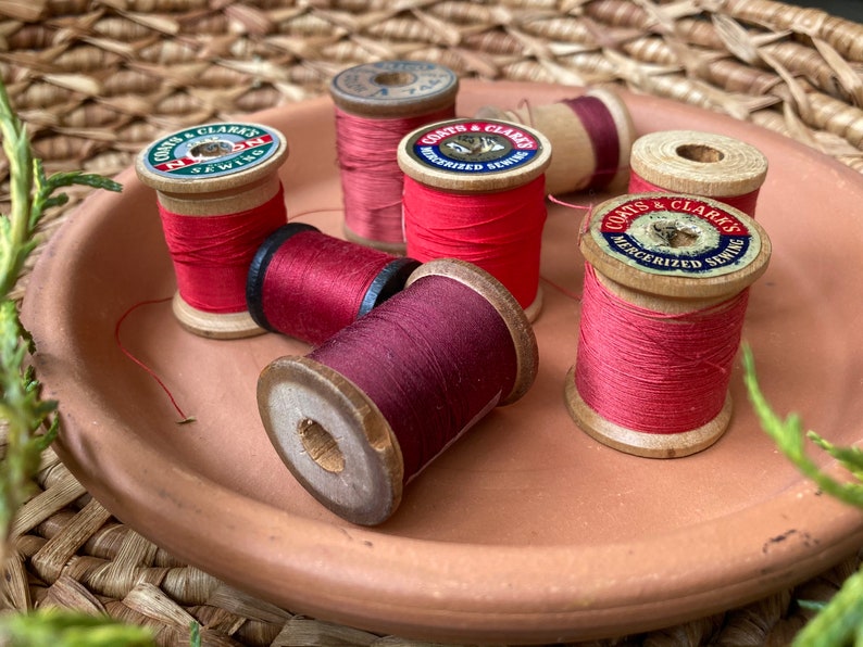 8 Vintage Thread Spools seven are Wooden with Original String Advertising Quilting Crafting Cotton and Silk Lot 74Red USA