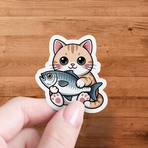Cute Tabby Cat Holding Fish Sticker, Kawaii Animal Art Decal, Cartoon Pet Lover Gift, Whimsical Illustration Stickers