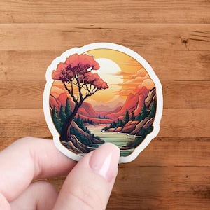 Zonsondergang berglandschap, sticker natuurlandschap, vinylsticker avontuur buiten, levendige landschapskunst, wandelpad, waterbestendig