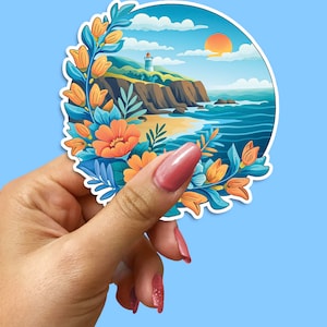 Sticker plage, sticker phare, fleurs bleu orange, art côtier, scène d'océan, design nautique, décoration de bord de mer, illustration maritime