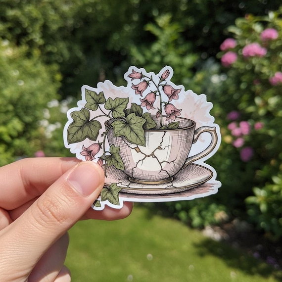 Botanical Teacup Sticker – Cracked China with Ivy & Bellflowers, Glossy Vinyl Cottagecore Decor