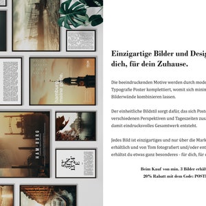 May include: A set of framed prints featuring images of Hamburg, Germany. The prints are in black frames and feature a variety of architectural and cityscape views. The text on the prints reads "hamburg, meine perle." which translates to "Hamburg, my pearl."
