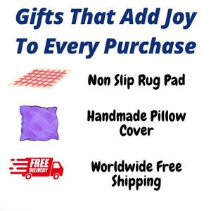 May include: A graphic display featuring the text Gifts That Add Joy To Every Purchase. It includes a beige non-slip rug pad with a red grid, a purple handmade pillow cover, and a red truck icon labeled Worldwide Free Shipping.