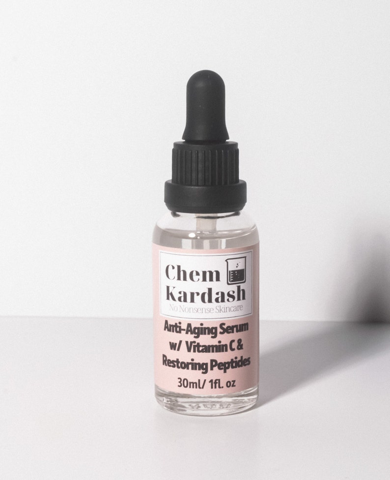 ChemKardash® Antiaging Serum. Pink label, 1oz white background, Vitamin C and restoring Peptides