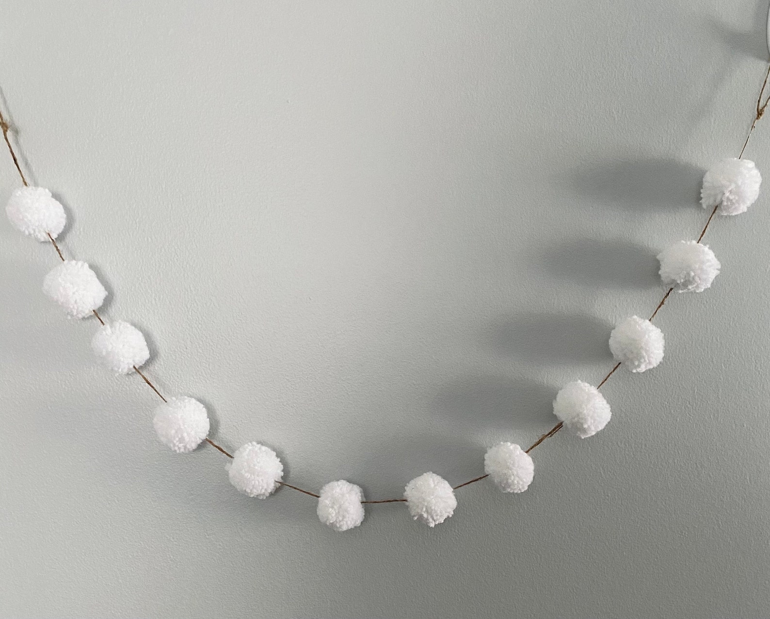 red and white pom pom garland