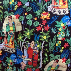 May include: A black fabric with a colorful repeating pattern of Frida Kahlo, flowers, and tropical plants. The pattern is a vibrant mix of red, yellow, green, blue, and orange.