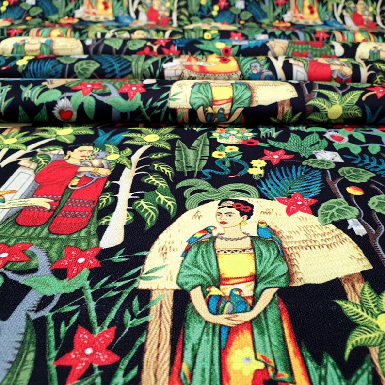 May include: Black fabric with a colorful repeating pattern featuring a woman with a unibrow, flowers, and birds. The woman is wearing a green shawl and a yellow dress. The fabric is perfect for crafting projects like clothing, bags, and home decor.