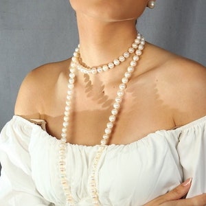 Lange parelketting, natuurlijke parelketting, in de buurt van ronde parelketting, verklaring parelketting, witte parelketting, bruidsparelcadeau