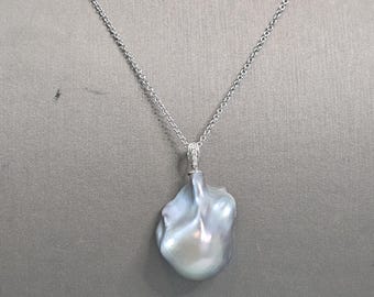 Blå barockpärlhänge med diamanter